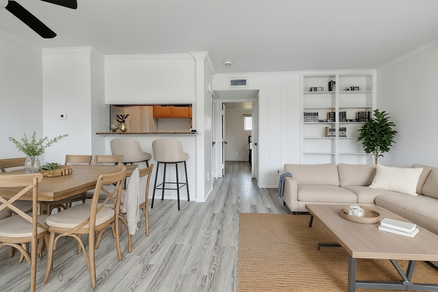 6402 Del Monte Drive, Unit 65 Houston, TX 77057 - Photo 3 of 21 a living room with furniture and a flat screen tv