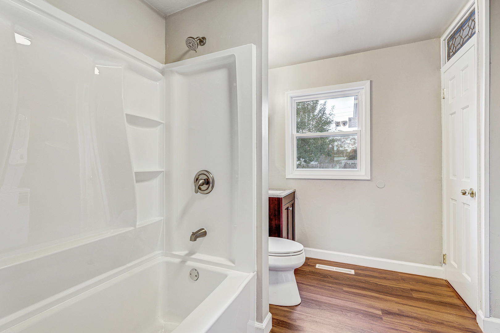 8 Timber Trail Streamwood, IL 60107 - Photo 21 of 27 a bathroom with a bathtub and a toilet