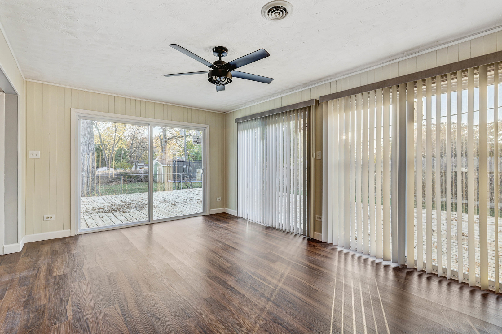 8 Timber Trail Streamwood, IL 60107 - Photo 10 of 27 wooden floor in an empty room with a window