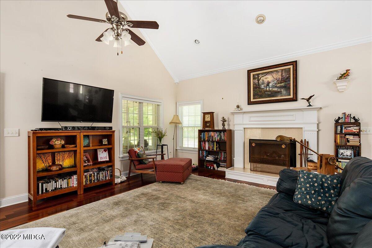 146 Lower Simmons Road Macon, GA 31220 - Photo 11 of 43 a living room with furniture and a flat screen tv