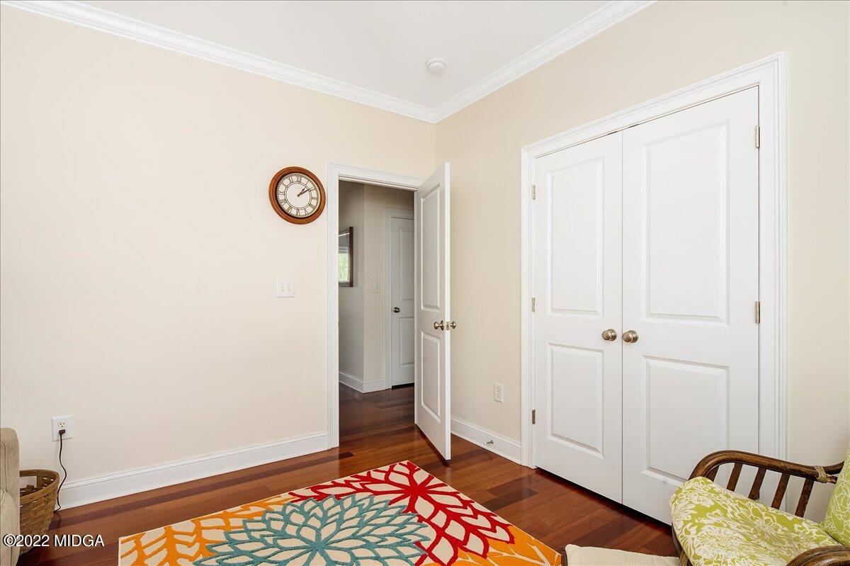 146 Lower Simmons Road Macon, GA 31220 - Photo 15 of 43 a view of room with window and wooden floor