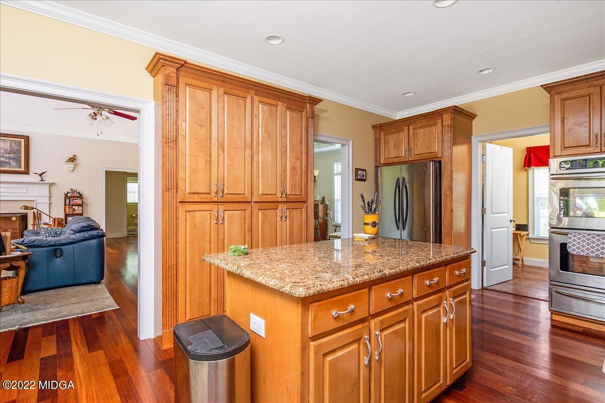 146 Lower Simmons Road Macon, GA 31220 - Photo 21 of 43 a kitchen that has a cabinets and a table in it