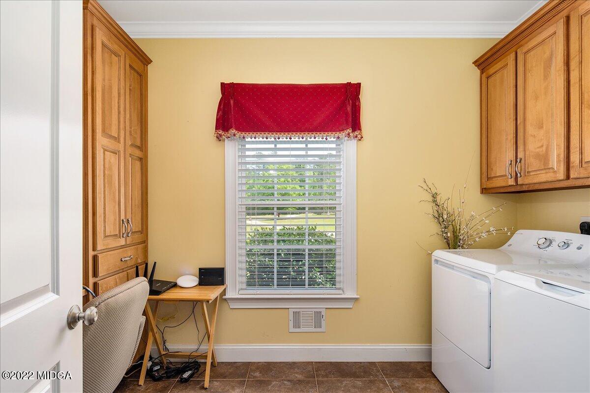 146 Lower Simmons Road Macon, GA 31220 - Photo 23 of 43 a view of a workspace with furniture and a window