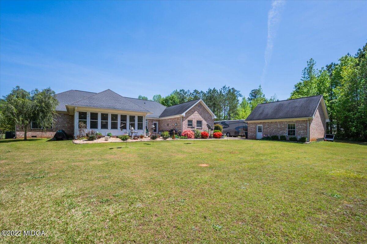 146 Lower Simmons Road Macon, GA 31220 - Photo 40 of 43 a front view of house with an outdoor space and seating