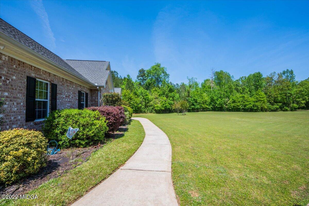 146 Lower Simmons Road Macon, GA 31220 - Photo 43 of 43 a front view of a house with a yard