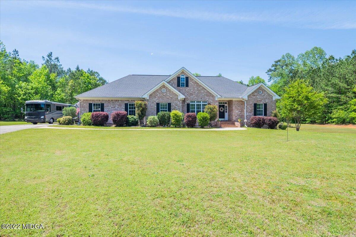 146 Lower Simmons Road Macon, GA 31220 - Photo 5 of 43 a front view of house with yard and green space