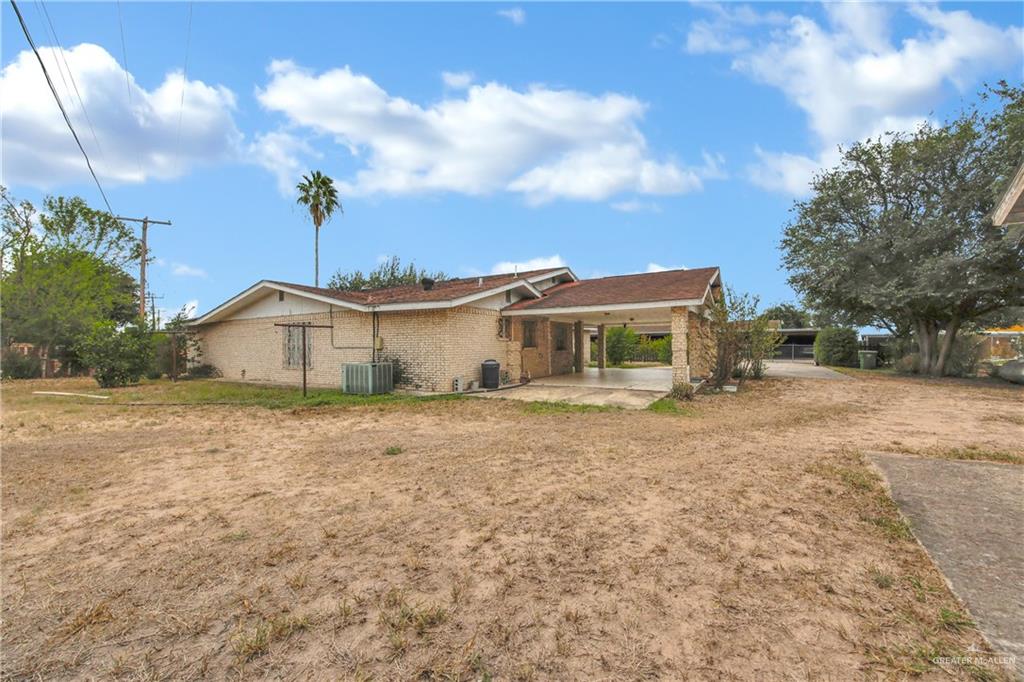 18 Bellas Lane Rio Grande City, TX 78582 - Photo 18 of 28 a front view of a house with a garden and yard