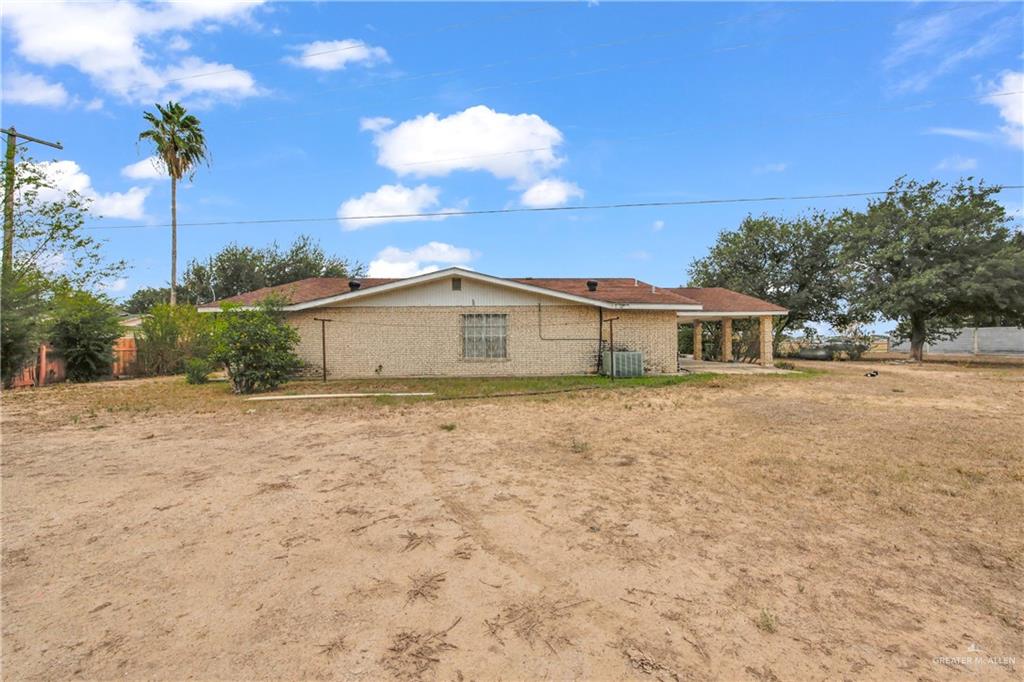 18 Bellas Lane Rio Grande City, TX 78582 - Photo 19 of 28 a front view of a house with a yard