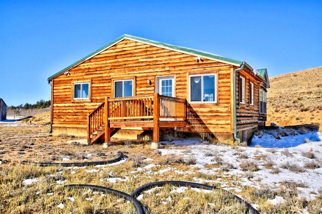 631 Murphy Road Como, CO 80432 - Photo 19 of 21 a view of a house with a yard