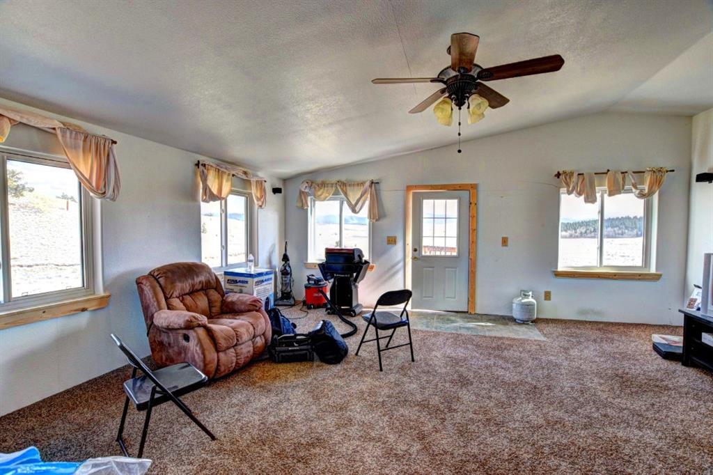 631 Murphy Road Como, CO 80432 - Photo 6 of 21 a living room with furniture and a window