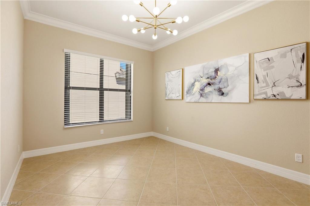 11505 Summerview Way Fort Myers, FL 33913 - Photo 11 of 50 an empty room with windows and fan