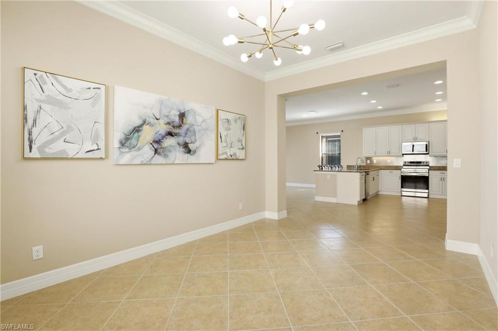 11505 Summerview Way Fort Myers, FL 33913 - Photo 4 of 50 a view of a kitchen with furniture and a chandelier fan