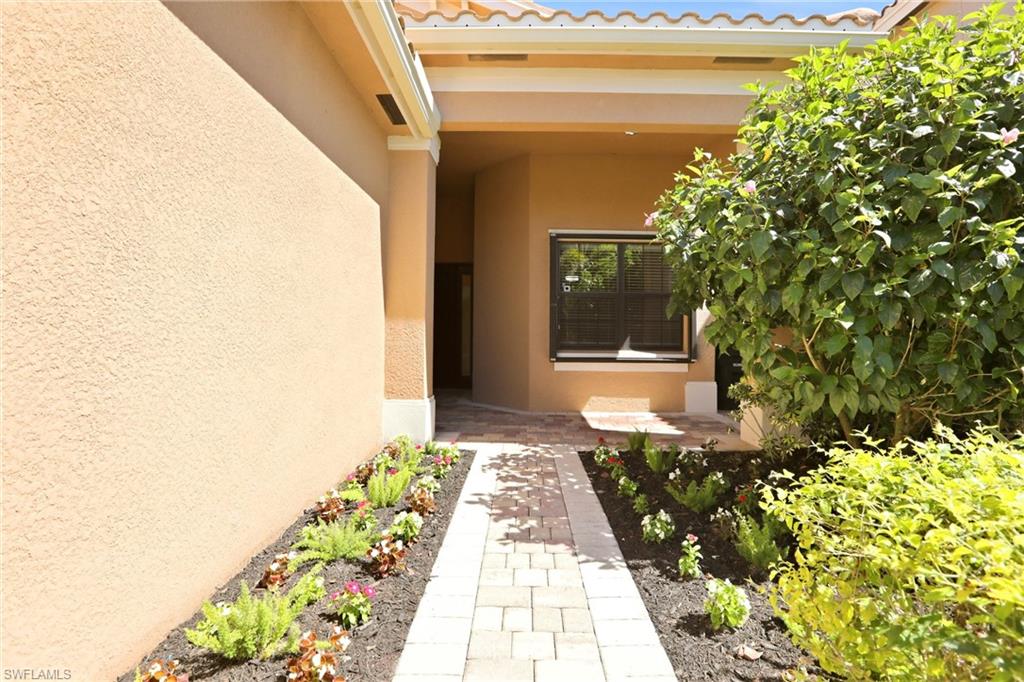 11505 Summerview Way Fort Myers, FL 33913 - Photo 41 of 50 a front view of a house with a yard