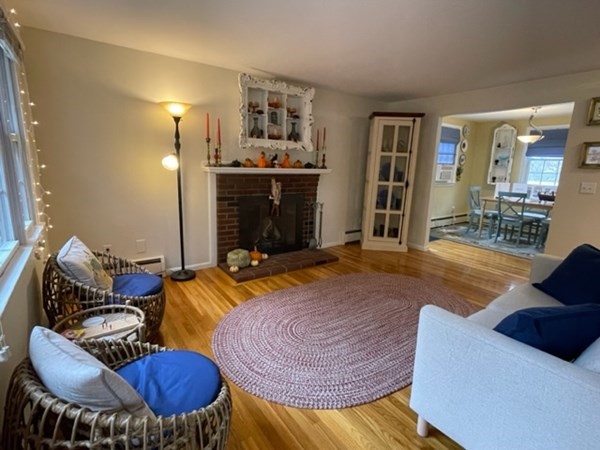 72 Summer Hill Road Maynard, MA 01754 - Photo 8 of 38 a living room with furniture and a fireplace