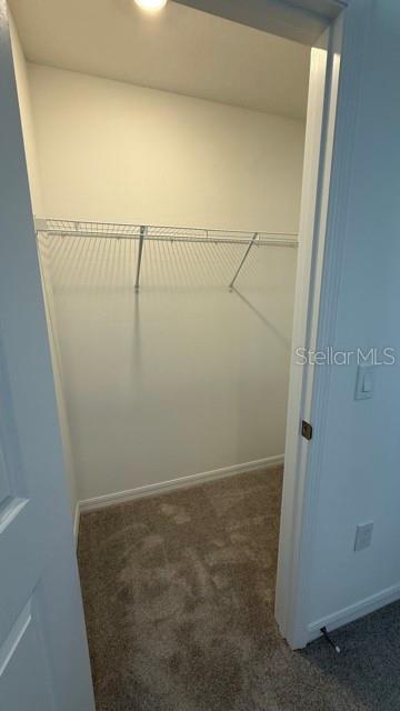 2957 Skyline Loop Kissimmee, FL 34758 - Photo 15 of 23 view of a room with racks on the wall