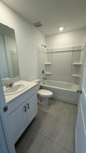 2957 Skyline Loop Kissimmee, FL 34758 - Photo 20 of 23 a bathroom with a sink a toilet and shower