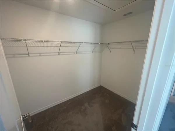 a view of a room with racks on the wall