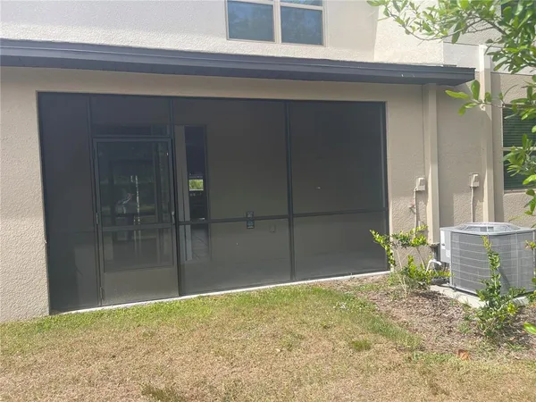 a view of backyard and porch