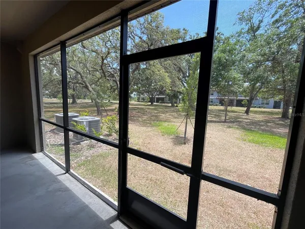 a view of an outdoor with a large window