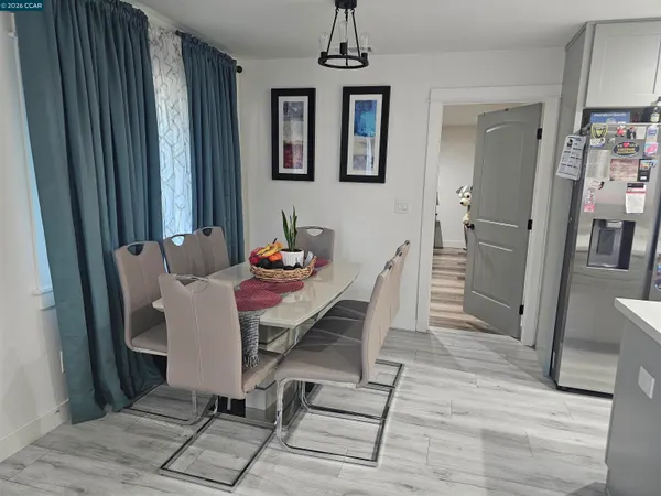 a bedroom with a bed and flat screen tv