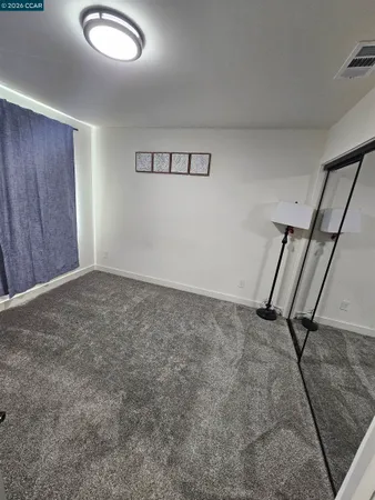 a bathroom with a sink a toilet a shower and a mirror