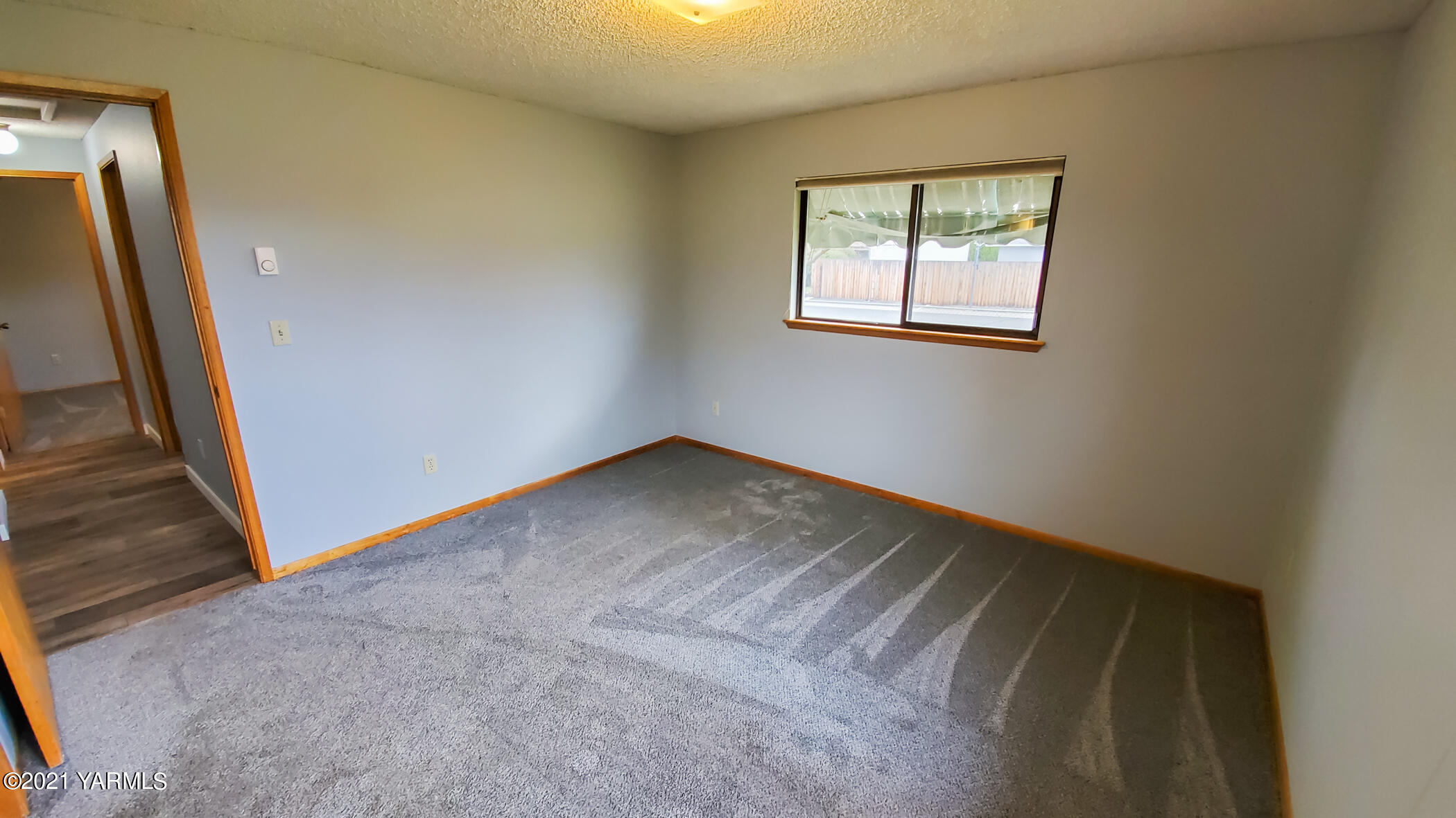1503 South 27th Avenue Yakima, WA 98902 - Photo 14 of 26 an empty room with windows and closet