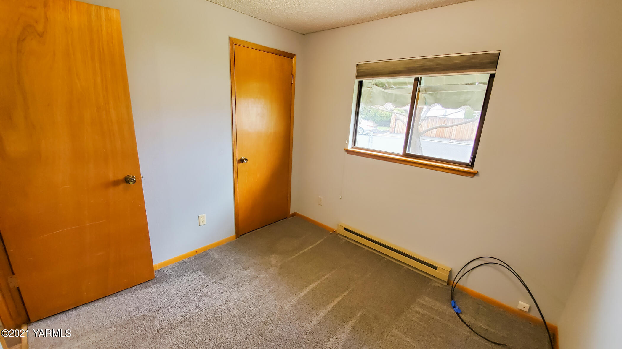 1503 South 27th Avenue Yakima, WA 98902 - Photo 17 of 26 a view of a room with closet