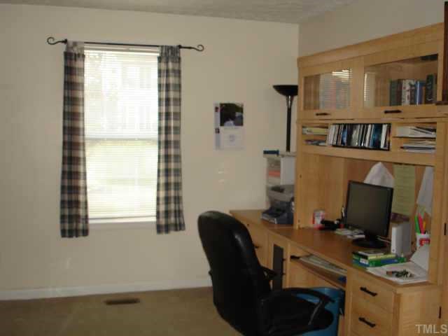 Roomy first floor study/office can provide needed privacy by closing doors or can be used as a play/game/media room.