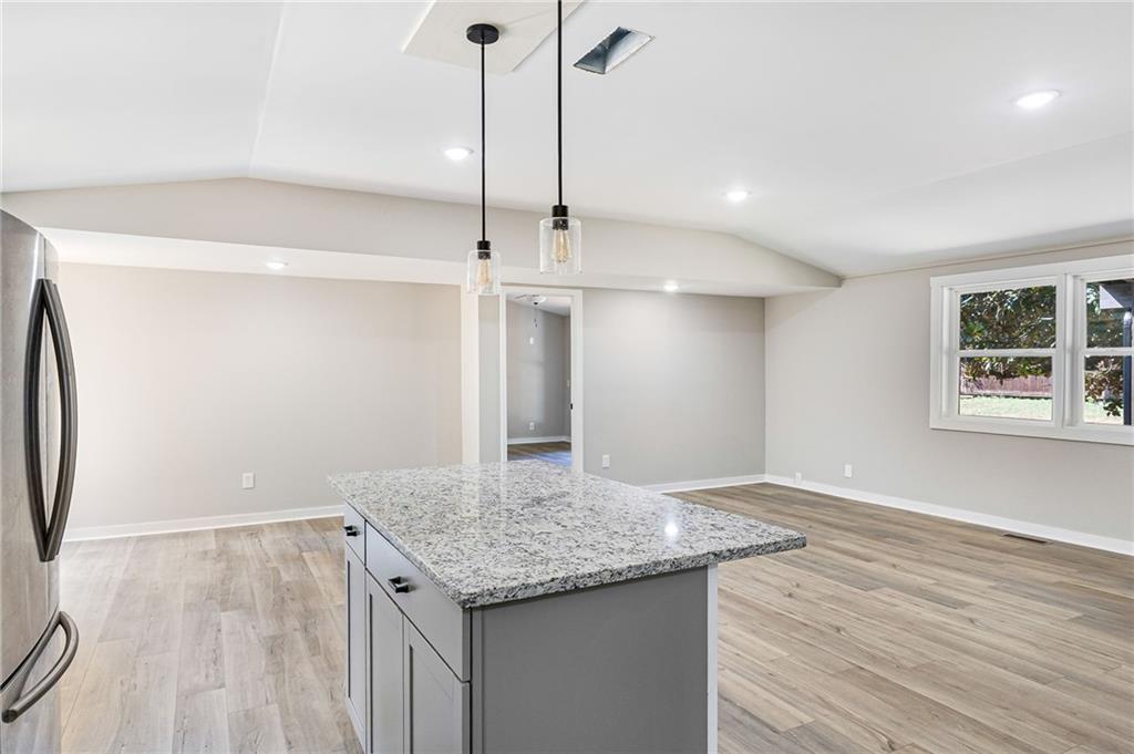 1265 Horsley Mill Road Carrollton, GA 30116 - Photo 14 of 31 a bathroom with a granite countertop sink and a mirror