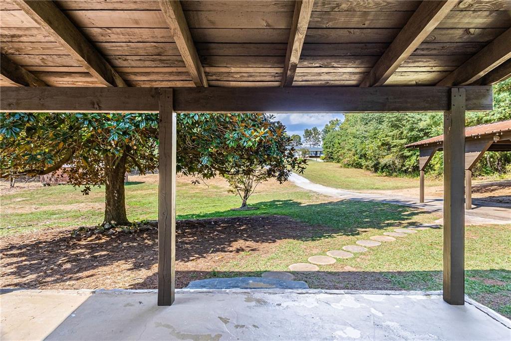 1265 Horsley Mill Road Carrollton, GA 30116 - Photo 21 of 31 a view of a backyard of the house