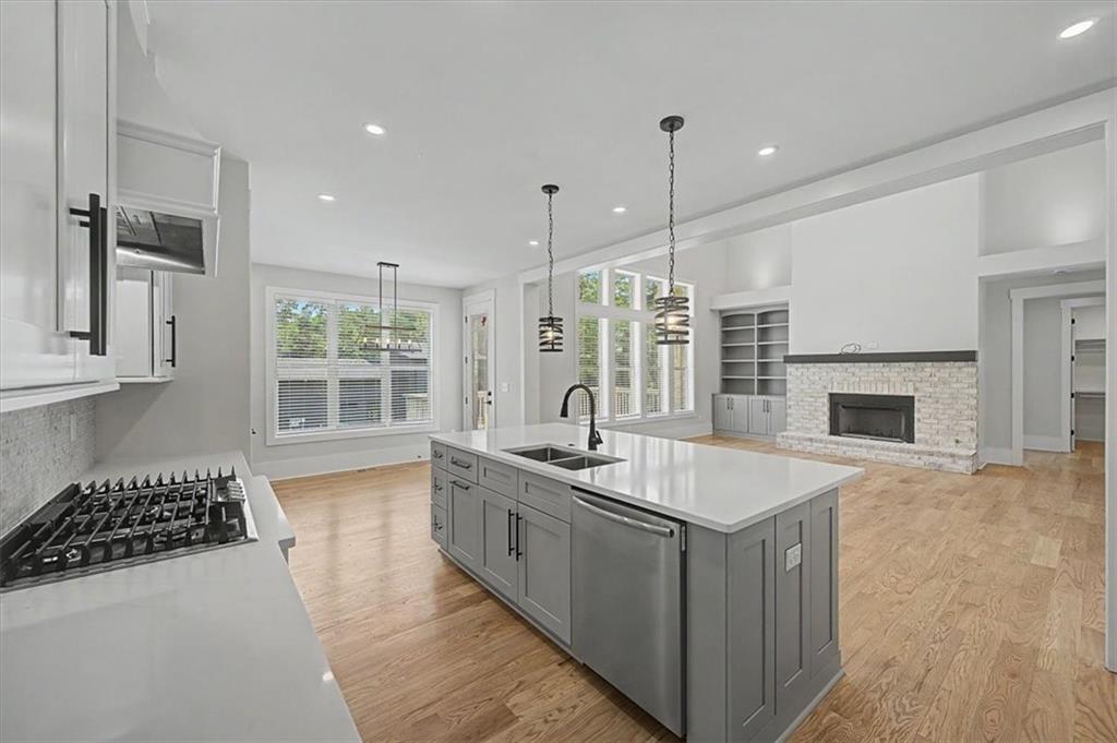 217 Laura Lake Road Marietta, GA 30066 - Photo 17 of 54 a large kitchen with stainless steel appliances granite countertop a sink stove and granite counter tops