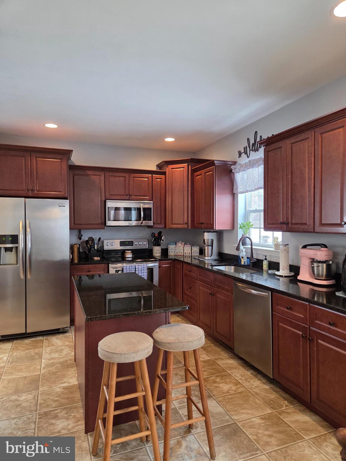 119 Burgundy Lane Coatesville, PA 19320 - Photo 12 of 35 Spacious kitchen with island and granite counters