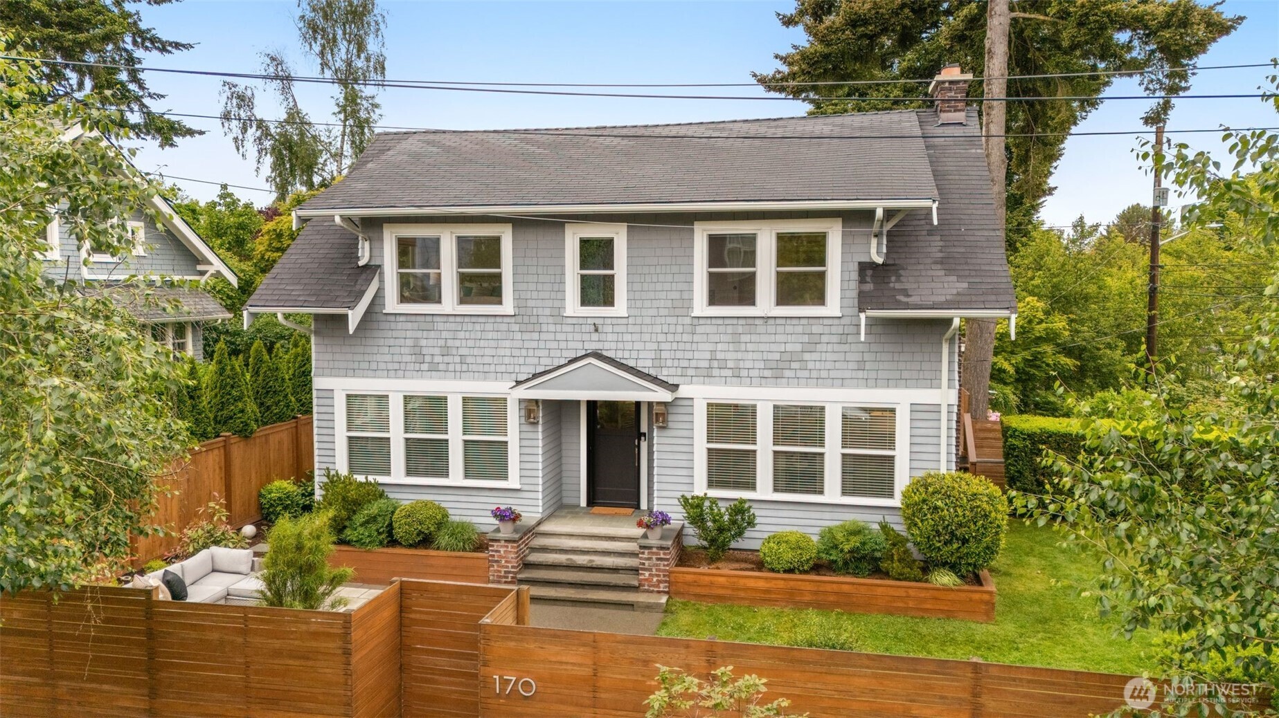 170 Lynn Street Seattle, WA 98109 - Photo 31 of 40 a front view of a house with a yard