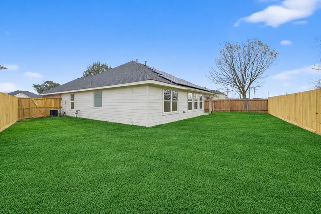 a bathroom with a sink a toilet and bathtub