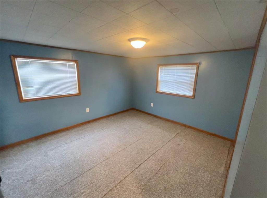 409 1st Street Chestnut Ridge, PA 15422 - Photo 22 of 31 an empty room with a window