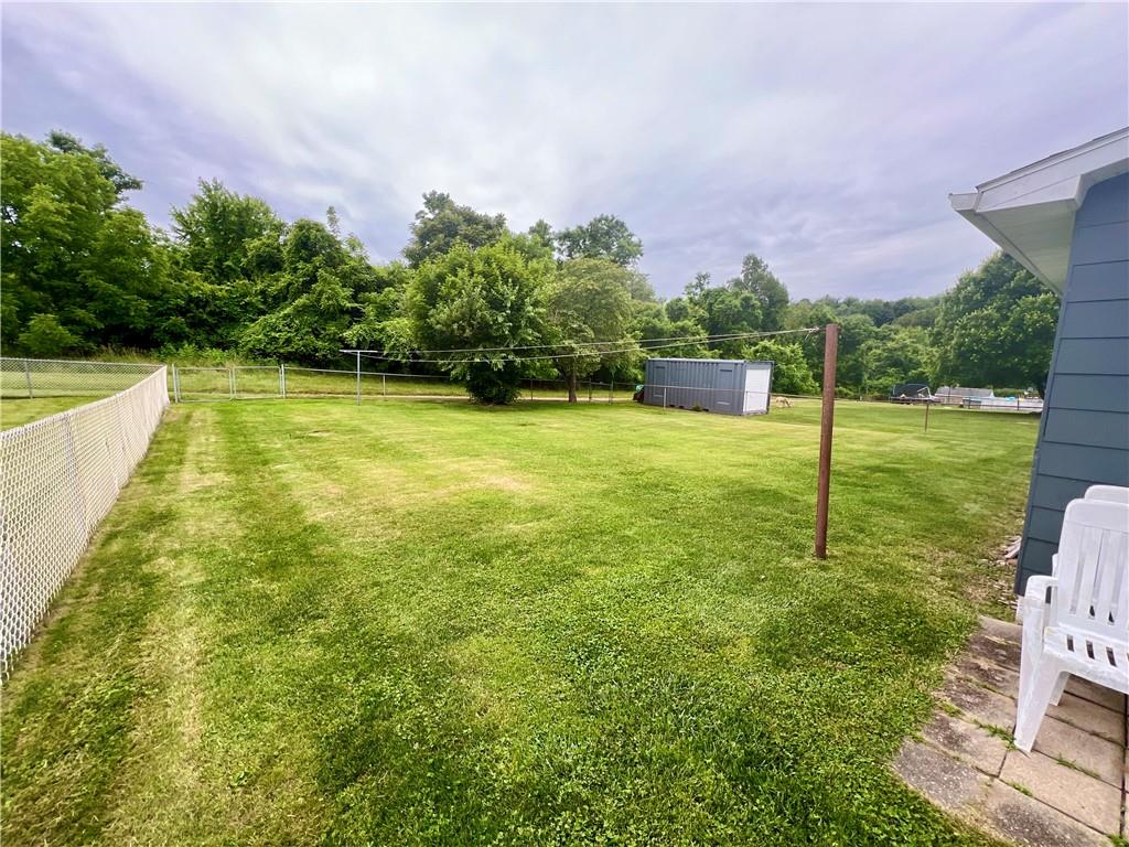 409 1st Street Chestnut Ridge, PA 15422 - Photo 27 of 31 a view of a big yard with a large tree