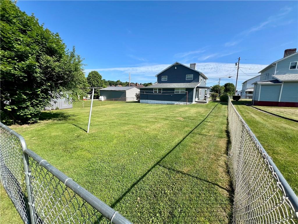 409 1st Street Chestnut Ridge, PA 15422 - Photo 7 of 31 a view of a house with basketball court