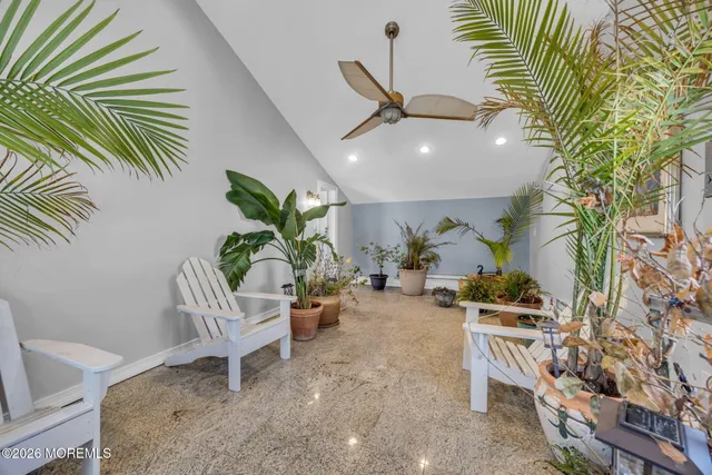 an aerial view of a house with a garden