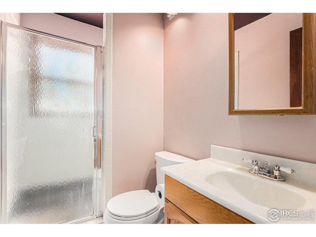 147 St Vrain Trail Ward, CO 80481 - Photo 17 of 31 a bathroom with a sink a toilet and shower