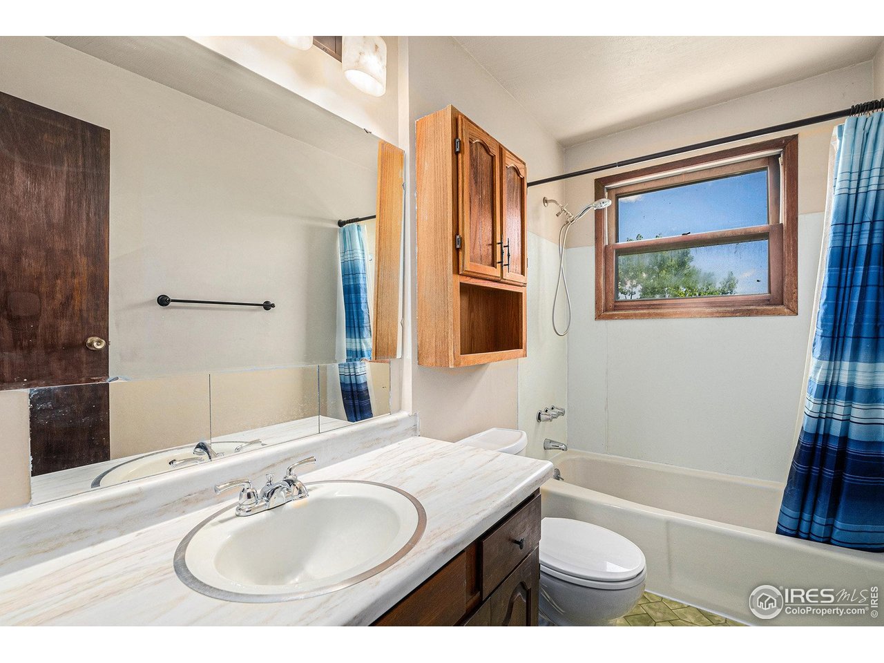 147 St Vrain Trail Ward, CO 80481 - Photo 20 of 31 a bathroom with a sink and a mirror
