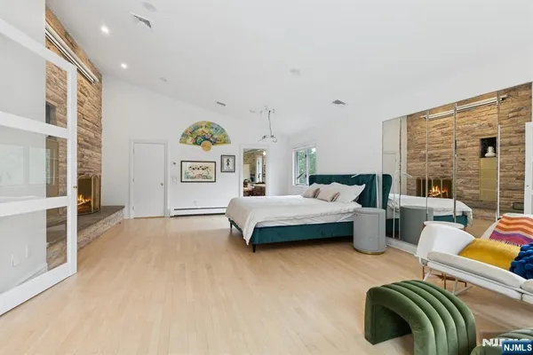 a bedroom with furniture and a couch