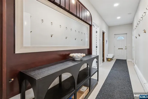 a kitchen with stainless steel appliances granite countertop a stove and a refrigerator