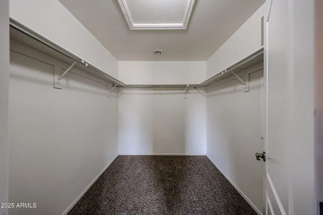 a view of a room with racks on the wall