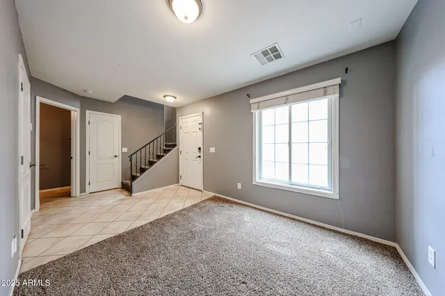 an empty room with windows