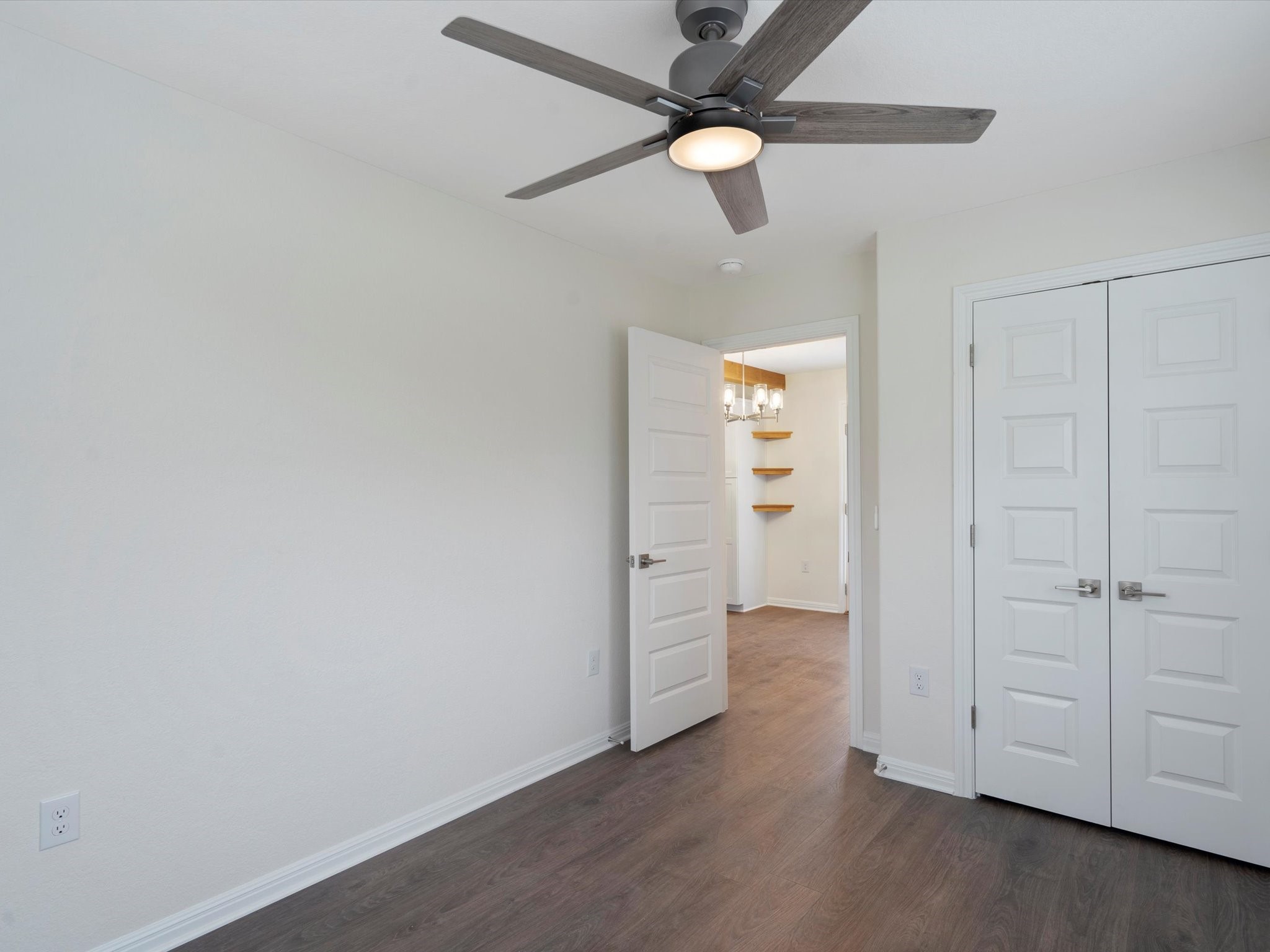 21007 Coleman Branch Creek Road Manor, TX 78653 - Photo 17 of 31 Additional bedroom with closet storage and natural light.