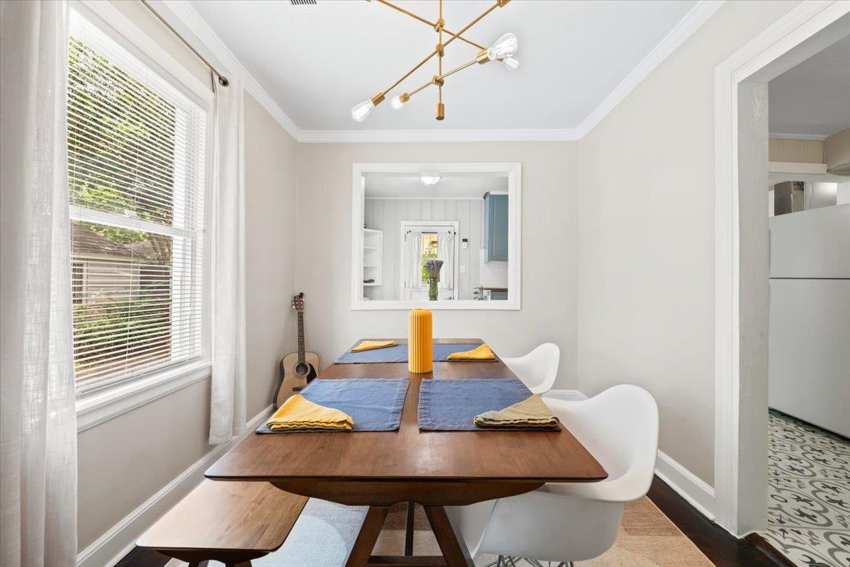 1049 McEvers Road Memphis, TN 38111 - Photo 16 of 28 a view of a dining room with furniture and wooden floor
