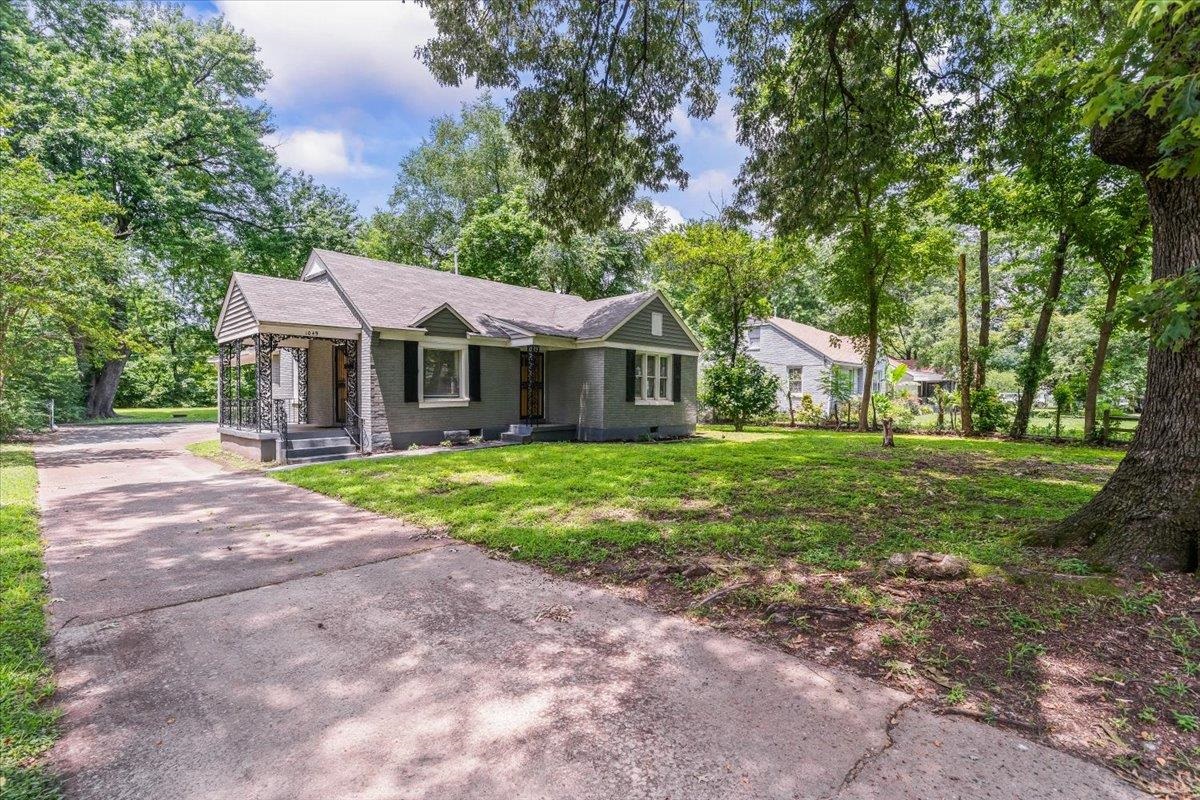 1049 McEvers Road Memphis, TN 38111 - Photo 2 of 28 a view of house with outdoor space and garden