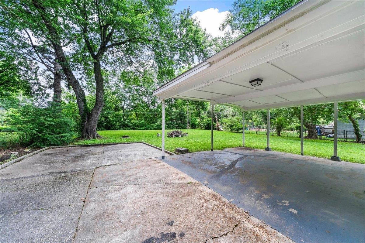 1049 McEvers Road Memphis, TN 38111 - Photo 8 of 28 a view of a park with plants and large trees