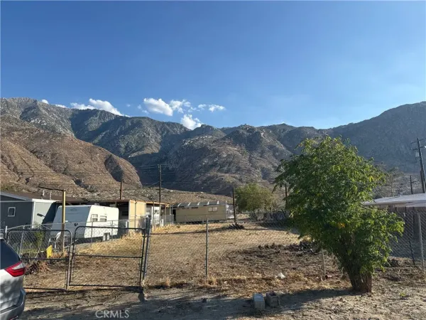 a view of houses with mountain view