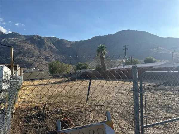 a view of a house with a mountain